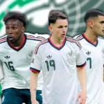 Quiñones, Fidalgo y Berterame con el uniforme de México.